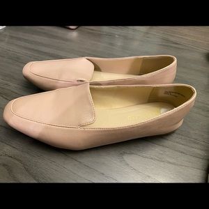 Pink flats, lightly worn.